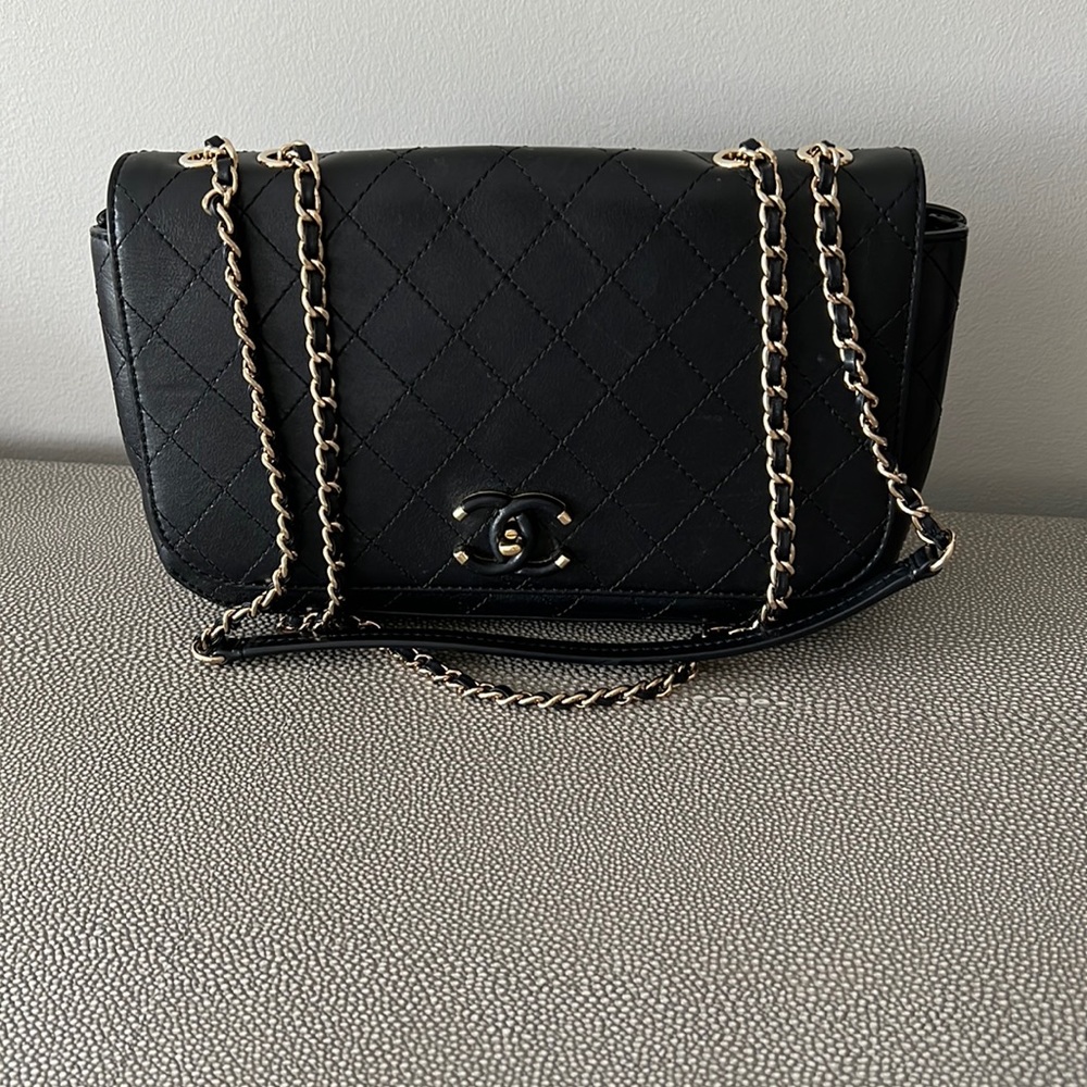 Beautiful black Chanel handbag with light gold hardware